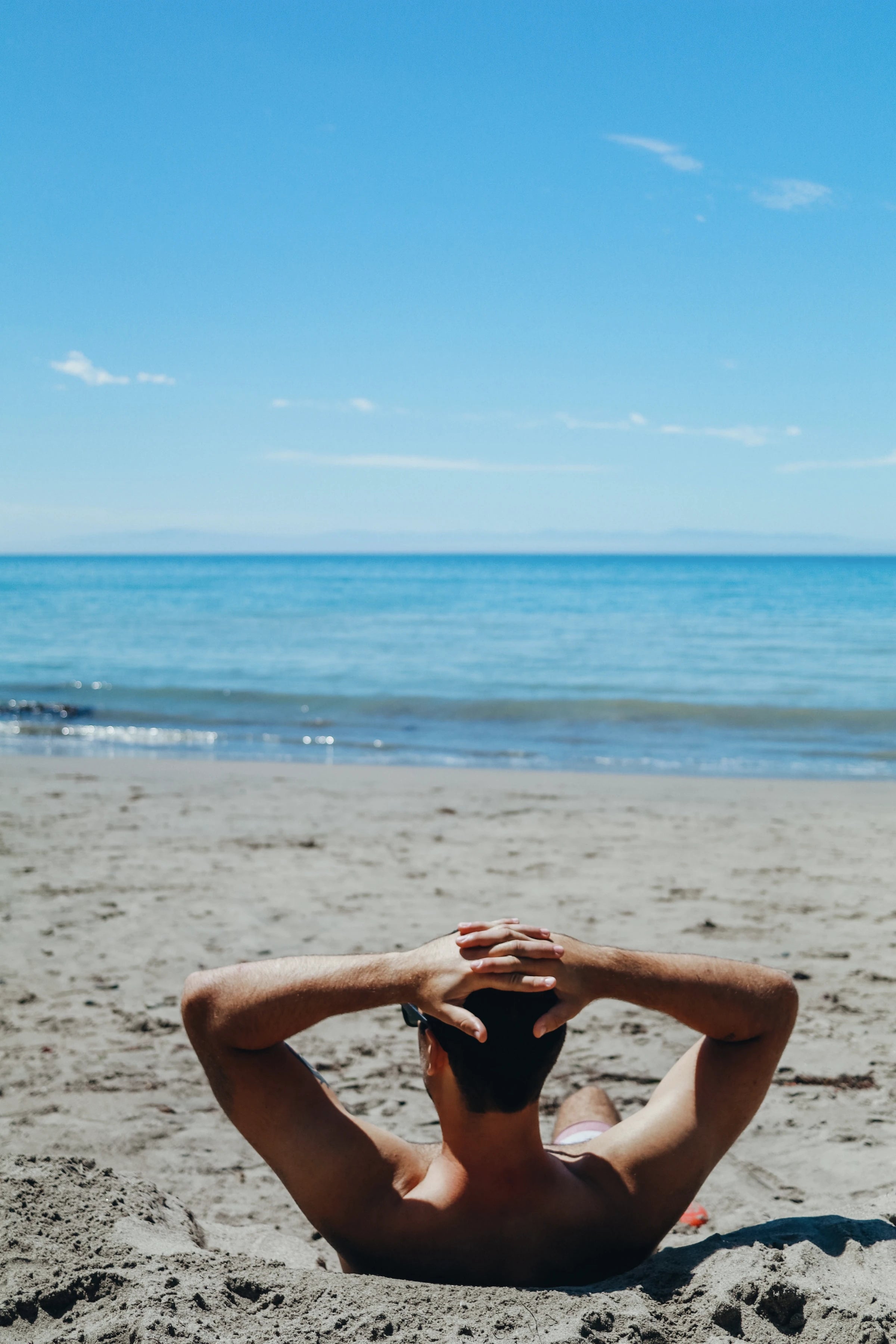 Full Body Waxed Man on beach vacation